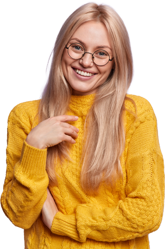 Young blonde girl with a big smile wearing a textured yellow sweater