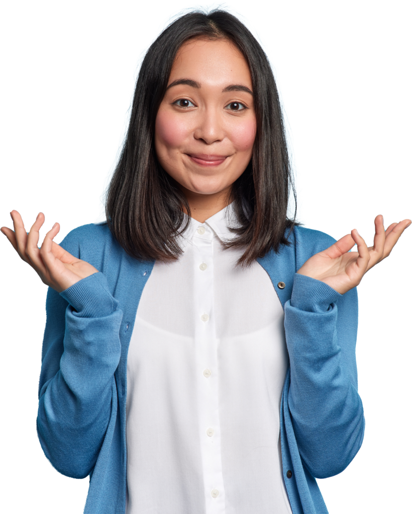 Asian women wearing a white button down and blue sweater making a "that was easy" gesture